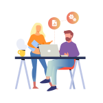 2 people sat with laptops discussing work