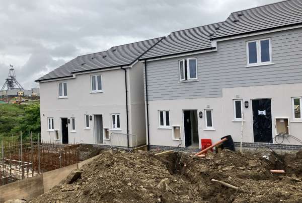 4 houses in building phase with work being carried out at the front